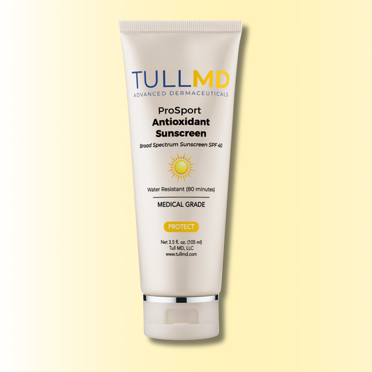 TullMD ProSport Antioxidant Sunscreen tube on a light yellow background