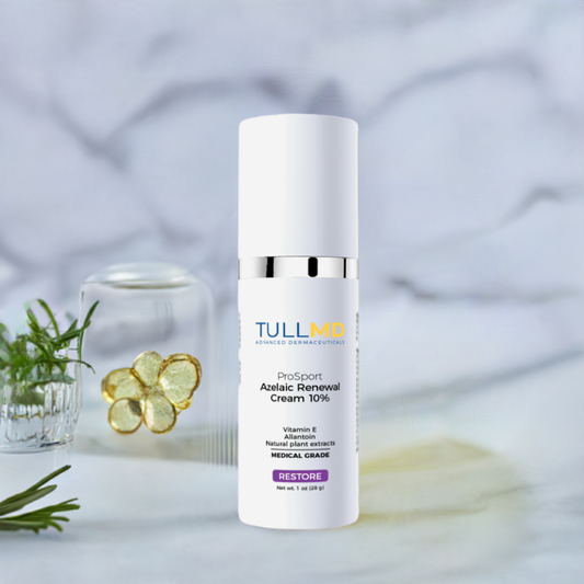 Tull MD ProSport Azelaic Renewal Cream 10% bottle on a counter with some of the ingredients in the background.